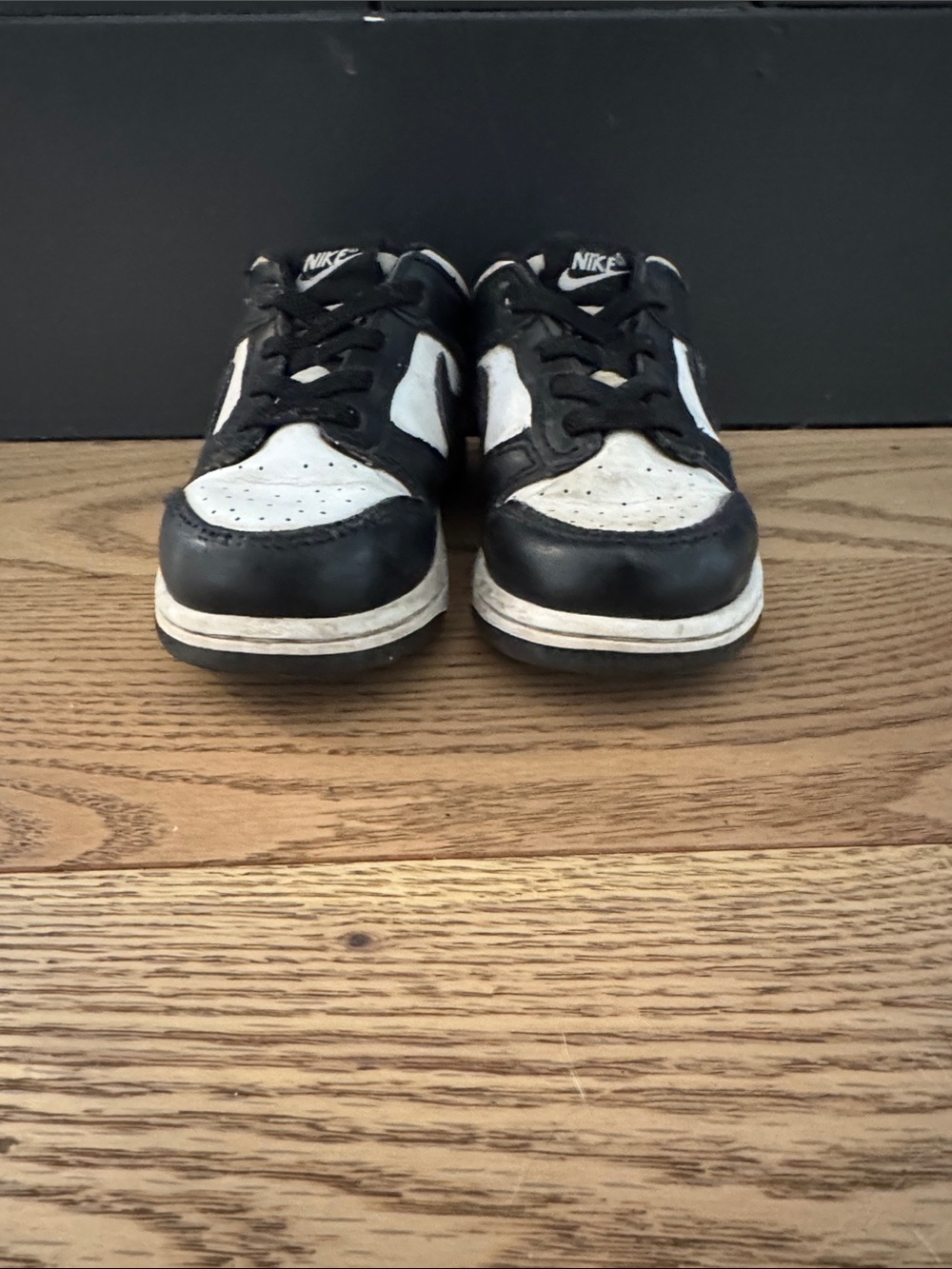 Nike Kids Black and White Low-Top Sneakers with Classic Two-Tone Design